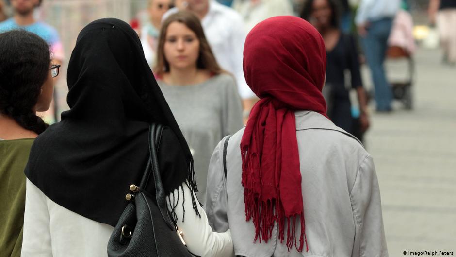 Muslim women's veil or hijab between a 